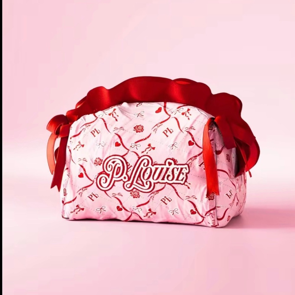 P. Louise pink and Red ruffles and zippered makeup Bag. New